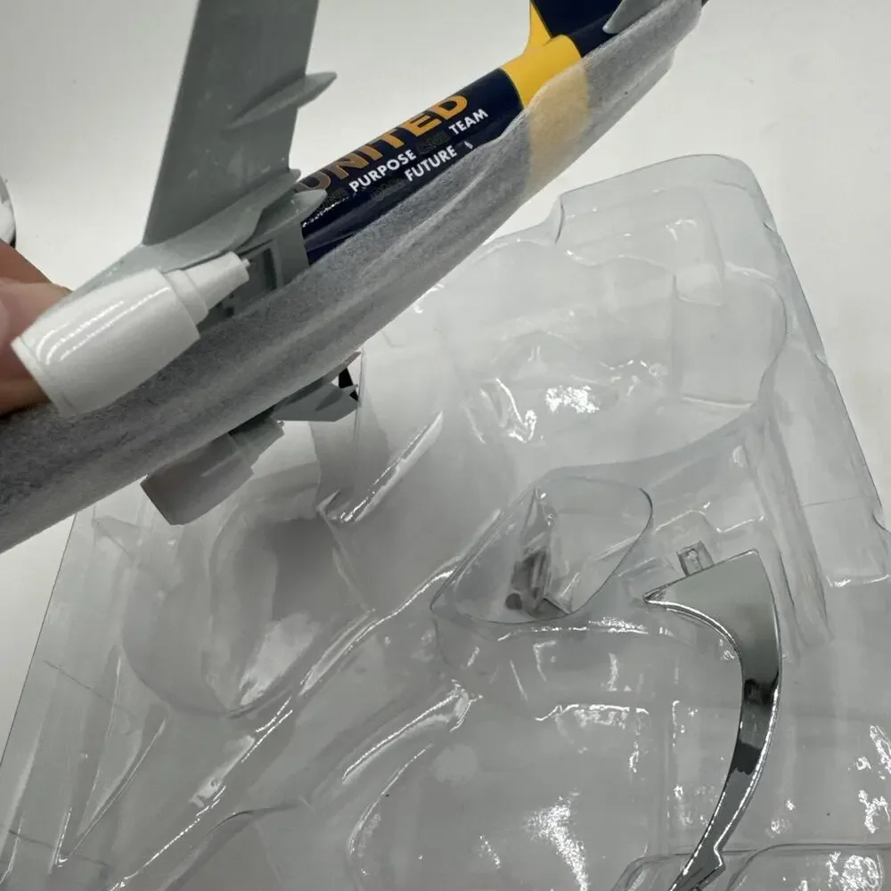 Gray Construction United Boeing Diecast Model Plane - 7.75” Long